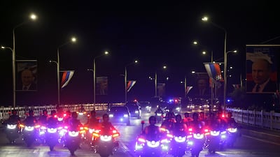 A North Korean motorcade takes Mr Kim and Mr Putin from the airport. EPA / Sputnik / Kremlin pool