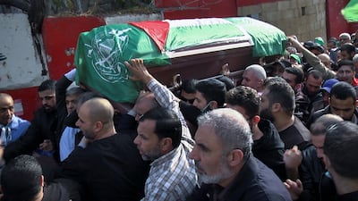 Men carry the coffin of a man who was killed in an explosion that occurred on Friday night in the Palestinian camp of Burj Al Shemali. Reuters