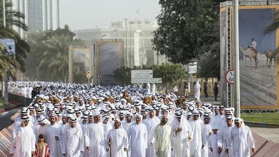 Sheikh Mohammed bin Rashid, Vice President and Ruler of Dubai, and Sheikh Mohammed bin Zayed, Crown Prince of Abu Dhabi and Deputy Supreme Commander of the Armed Forces, are joined by other sheikhs and dignitaries on the march from Al Manhal Palace to Qasr Al Hosn. Ryan Carter / Crown Prince Court - Abu Dhabi