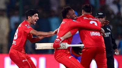 Islamabad United's players celebrate their victory over Multan Sultans to win the 2024 PSL final. AP