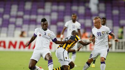 Asamoah Gyan, left, concedes Al Ain will have the advantage of travelling to Saudi Arabia and play Al Ittihad inside closed doors. Courtesy Al Ittihad