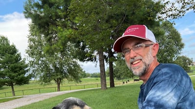 Jeff Bohnert in Perryville, Missouri, with his 13-year-old dog, Abby. AP