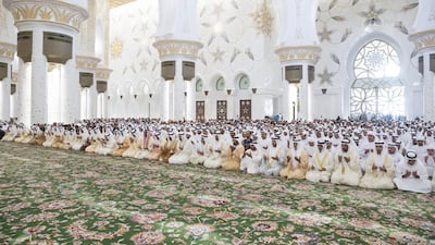 Sheikh Mohammed bin Zayed, Crown Prince of Abu Dhabi and Deputy Supreme Commander of the Armed Forces, attends Eid Al Fitr prayers at the Sheikh Zayed Grand Mosque with other dignitaries and government officials. Ryan Carter / Crown Prince Court - Abu Dhabi