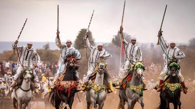 Moroccan horsemen perform traditional horse riding during a Moussem culture and heritage festival in the capital, Rabat. All photos by AFP