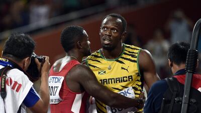 Usain Bolt and Justin Gatlin embrace after their race on Sunday in the men’s 100-metre final at the World Championships in Beijing, won by Bolt. Franck Robichon / EPA