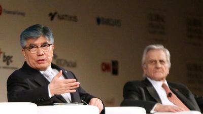 Choongsoo Kim, left, the governor of the Bank of Korea, and Jean-Claude Trichet, the former president of the European Central Bank. Fatima Al Marzooqi / The National