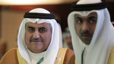 Bahraini foreign minister Sheikh Khalid bin Ahmed Al Khalifa, left, at the Manama Dialogue in 2015. Hasan Jamali / AP Photo