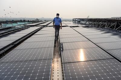 Solar panels installed at the Indian Environment Ministry in New Delhi, July 17. Money Sharma/AFP