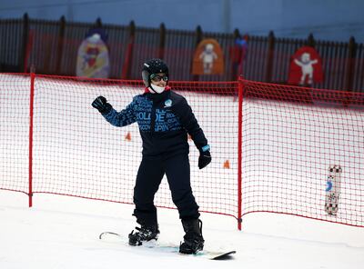 Snowboarder Mina Al Mazrouei trains for the Special Olympics. Click on the image to read stories of the 11 athletes representing the UAE in Turin.