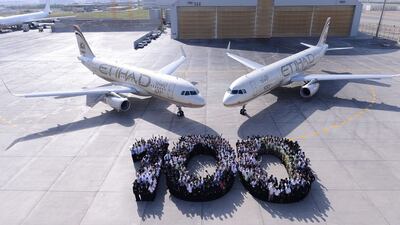 Etihad staff welcome the airline's 100th and 101st aircraft. Courtesy Etihad