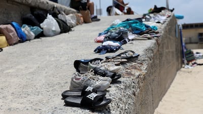 Belongings left behind are lined up at a ramp near the scene of the shooting. Reuters