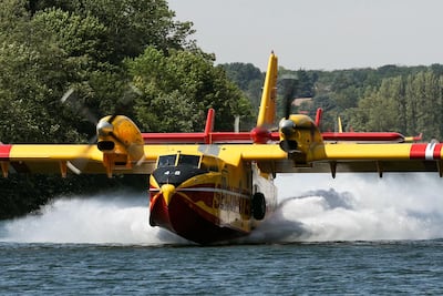 A seaplane participates in efforts to battle wildfires outside Paris. AFP