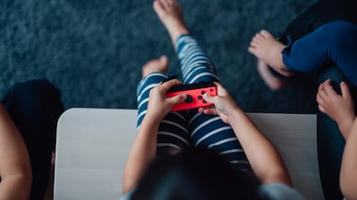 Child development experts have advised parents on what to look out for when identifying the early signs of gaming addiction in children. Getty Images