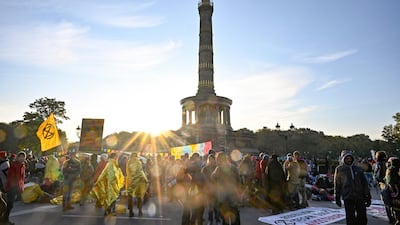 Extinction Rebellion protesters block the roads around the Victory Column to mark the beginning of demonstrations in Berlin. AFP
