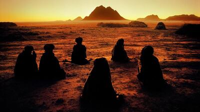 Kuchi nomads at prayer, 1992. Copyright ©Steve McCurry / Magnum Photos