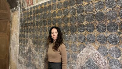 Dr Federica Gigante and the fresco in the Church of St Antonio in Polesine, Italy. Photo: Federica Gigante