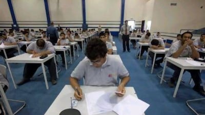 Pupils sit for an exam at the Applied Technology High School in Al Qusais, where they learn how important their contribution is to the UAE.