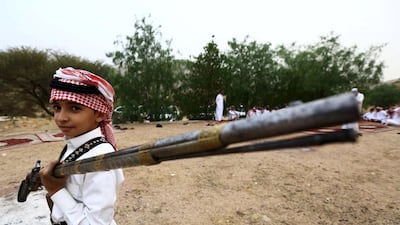 A boy on a traditional desert trip near the western Saudi city of Taif. Mohamed Al Hwaity / Reuters