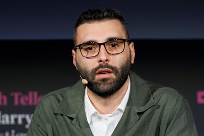 Palestinian photojournalist Motaz Azaiza speaks at the Sir Harry Evans Investigative Journalism Summit in London. Reuters