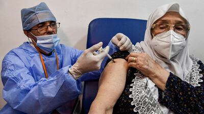 A medical worker administers a dose of Russia's Sputnik V vaccine for Covid-19. AFP