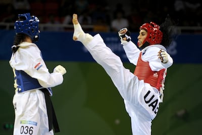 Sandra Saric of Croatia, left, and Sheikha Maitha bint Mohammed bin Rashid compete in the repechage round at the 2008 Olympics. AFP