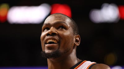 Kevin Durant had gone 12 straight games with at least 30 points before scoring 26 against Brooklyn on Friday. Marc Serota / Getty Images / AFP
