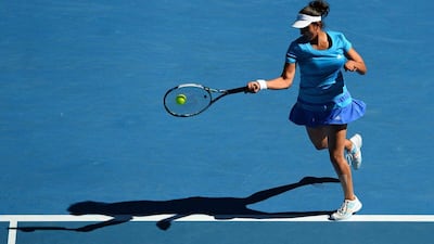 Sania Mirza and Romanian partner Horia Tecau lost the mixed doubles final at the Australian Open. William West / AFP