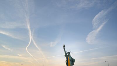 A replica of the Statue of Liberty in Colmar, eastern France, covered in the national colours of Ukraine. AFP
