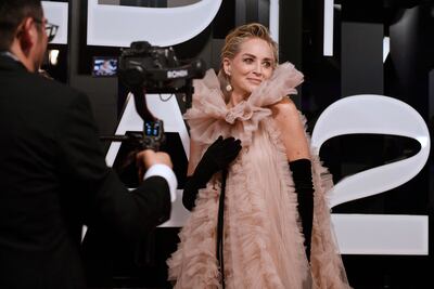 US actress Sharon Stone arrives wearing Bahraini label Monsoori on the red carpet at the opening ceremony. AFP
