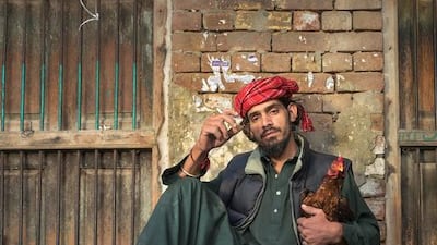 Portrait of a cockfighter in Sahiwal, Pakistan. Courtesy Sohail Karmani