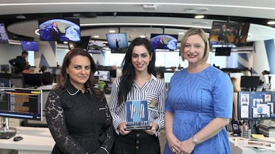 Mahinaz Hamza, winner of The National's Future of News journalism competition, pictured with Mina Al-Oraibi, editor-in-chief of The National and Laura Koot, managing editor. Chris Whiteoak / The National