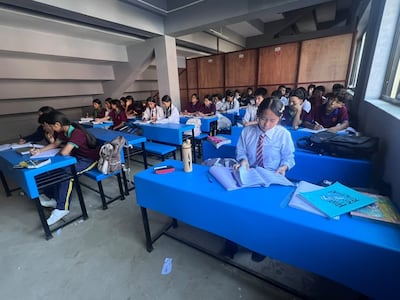 Some classes are conducted under the stairwell at a sports academy. Photo: Rajendra Dawadi