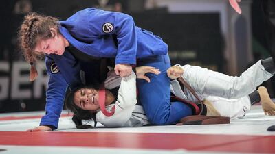 Samantha Cook, in blue, says she can carry on fighting for two more years. Victor Besa / The National