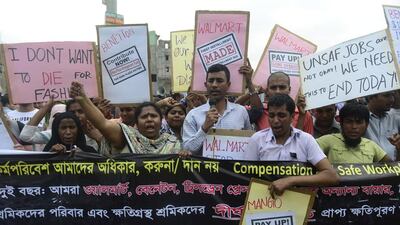 Marking the second anniversary of one of the world' worst industrial disasters, which left at least 1,138 people dead and more than 1,500 people injured. Munir Zaman / AFP