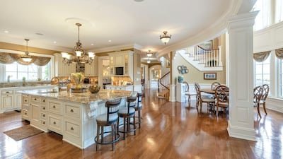 It comes with a number of kitchens. Courtesy Douglas Elliman Realty