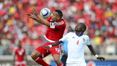 Emilio Nsue of Equatorial Guinea, left, and Congo’s Boris Moubio Ngounga vie for the ball during their African Cup of Nations Group A match at Bata that ended in a 1-1 draw on Saturday. Barry Aldworth / EPA
