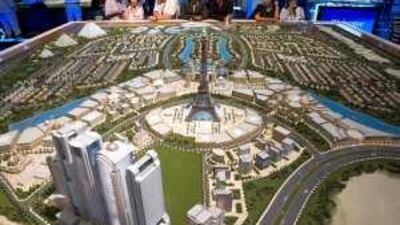 Visitors study a scale model of Falconcity in the Dubailand showroom during Cityscape Dubai last year.