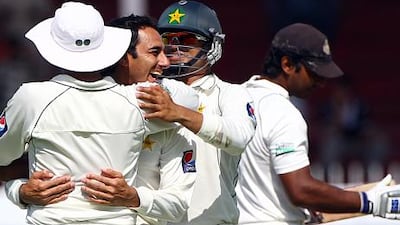Saeed Ajmal, centre, has taken 53 wickets from the past nine Test matches for Pakistan.