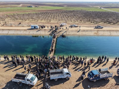 People flee an SDF-held area in the Aleppo countryside as tensions soar. Getty Images