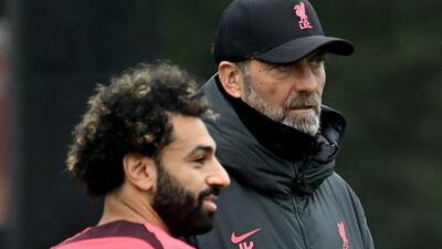 Liverpool boss Jurgen Klopp, right, and star forward Mohamed Salah. Getty Images