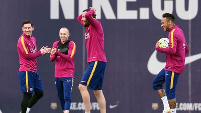(FromL) Barcelona’s Argentinian forward Lionel Messi, Barcelona’s midfielder Andres Iniesta, Barcelona’s defender Aleix Vidal and Barcelona’s Brazilian forward Neymar joke during a training session at the Sports Center FC Barcelona Joan Gamper in Sant Joan Despi, near Barcelona on April 1, 2016 on the eve their Spanish La Liga Clasico football match FC Barcelona vs Real Madrid. AFP / LLUIS GENE