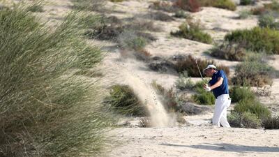 Josh Hill plays a shot on the 8th hole. Chris Whiteoak / The National