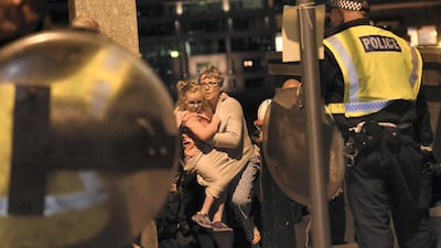 People are lead to safety on Southwark Bridge away from London Bridge after an attack on June 4, 2017 in London. Getty Images