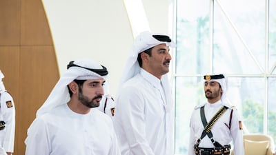 Sheikh Hamdan bin Mohammed, Crown Prince of Dubai, UAE Deputy Prime Minister and Minister of Defence, and Sheikh Tamim await the arrival of Sheikh Mohamed