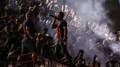 Paris Saint-Germain supporters react near Le Parc des Princes stadium after defeat by Bayern. EPA