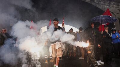 Dock workers take part in a strike near the port of Genoa, Italy, as part of a nationwide Let's Block Everything protest, with activists calling for a halt to arms shipments to Israel. Reuters