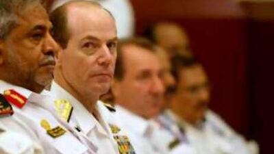 US Vice Admiral Kevin Cosgriff (second left), Commander of the US 5th Fleet, sits with Rear Admiral Ahmed Mohammed al-Sabab al Tenaji (left), commander of the UAE Navy, at a Gulf Naval Commander meeting in Abu Dhabi today.