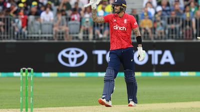 England's Alex Hales celebrates reaching his half century. AFP
