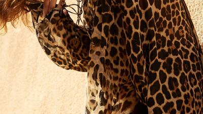 Call of the wild: Blouse, Dh12,950; trousers, Dh4,450, both from Saint Laurent by Anthony Vaccarello