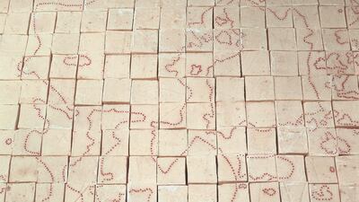 Mona Hatoum, Present Tense Installation view at Gallery Anadiel, Jerusalem (1996) Soap and glass beads 4.5 x 299 x 241 cm. (1.75 x 117.75 x 95 in.) © Mona Hatoum. Courtesy Gallery Anadiel, Jerusalem (Photo: Issa Freij)